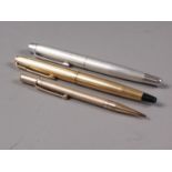 A gold coloured Parker fountain pen, a rolled gold propelling pencil and a Burnham fountain pen
