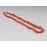 A vintage stick coral necklace with unmarked yellow metal bolt and jump rings, 19" long, an