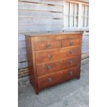 A mid 18th century oak, mahogany and rosewood banded chest of one frieze drawer, two short and three