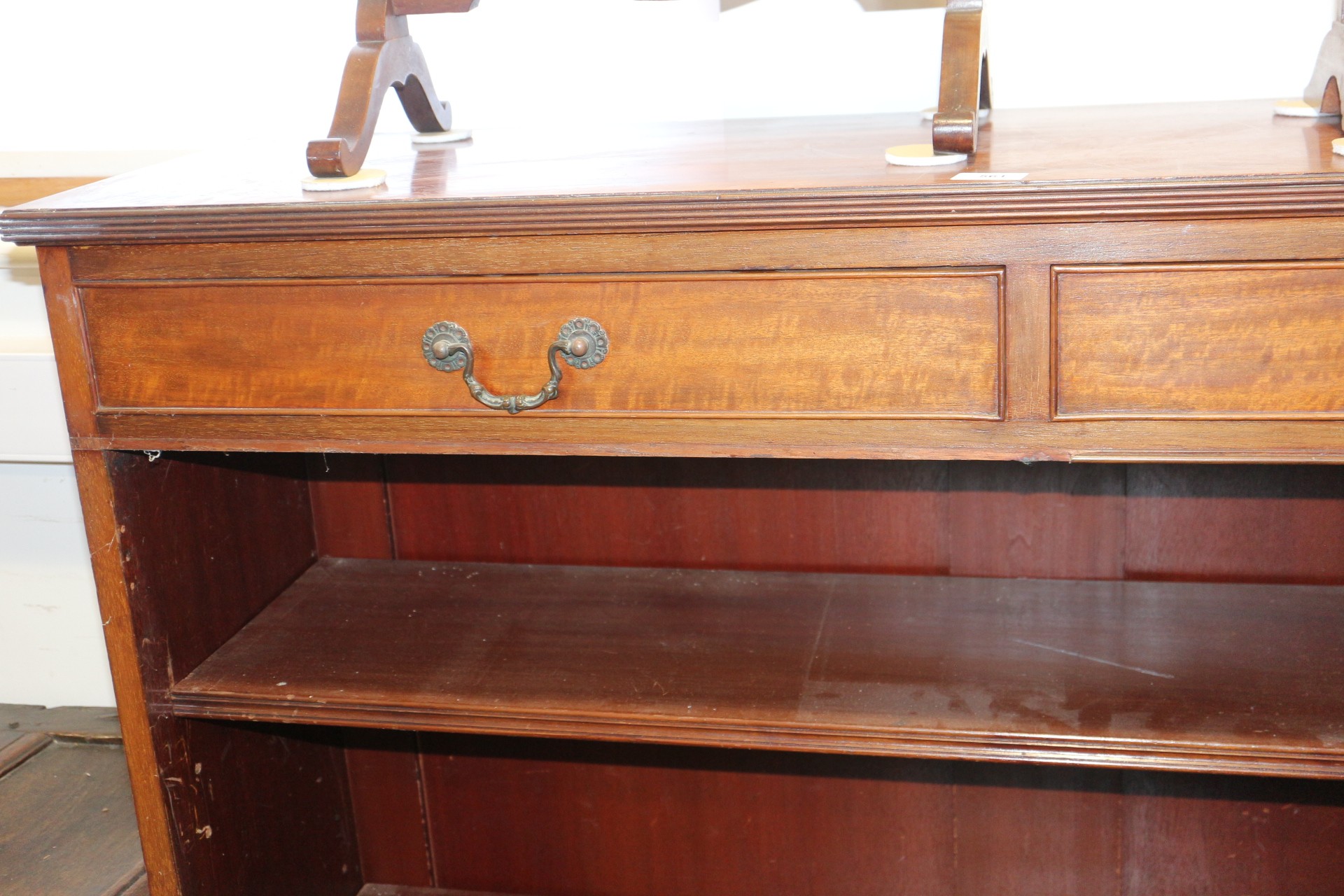 A Maples late 19th century walnut bookcase, fitted two drawers over open shelves, on bracket feet, - Image 9 of 12