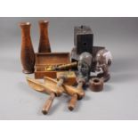A pair of turned hardwood vases, 9 3/4" high, a carved wood inkwell, a pair of shoe lasts, a brass