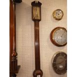 A Georgian walnut and ebony line inlaid stick barometer and thermometer, by N Tara