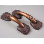 A pair of patinated cast bronze urological door handles, 12" long