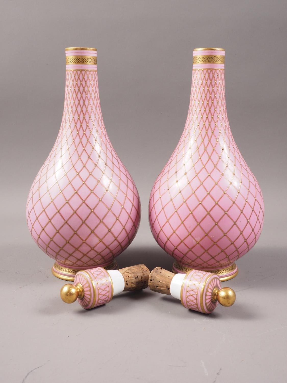 A pair of Sevres style porcelain bottle vases and covers with all-over lattice decoration on a - Image 3 of 3