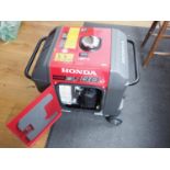 A Honda inverter EU 30 ISO 3KW silent electric generator, on castored supports, complete with