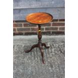 A mahogany wine table, on turned column and tripod support, 11 1/2" dia x 20 1/2" high, and a larger