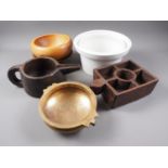 A bronze two-handled bowl, a carved wood jug, a carved wood spice container, a ceramic commode
