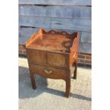 A 19th century mahogany tray top washstand enclosed two doors over pull-out slide, 21 1/2" wide x