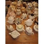 A collection of twenty-eight contemporary china teapots, including Royal Cauldon "Victoria" and