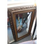 A gilt pierced and velvet lined rectangular wall mirror, 11" wide x 23 1/2" high