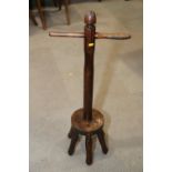 A 19th century elm wash dolly, 36" high, and a 19th century low seat nursing chair, on turned