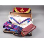 Two cased Masonic aprons, a Masonic jewel, and a cased set of Masonic documents
