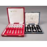 A cased set of six silver Art Deco style teaspoons and a cased set of six silver coffee spoons,