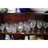 Ten cut glass wines, six cut glass tumblers, seven brandy balloons, six other glasses, a heavy cut