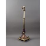 A brass and copper lamp base, 22" high, and an oil lamp with milk glass shade