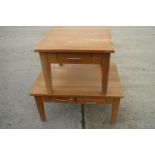 A light oak coffee table, fitted four drawers, on square taper supports, 36" wide x 24" deep x 19"