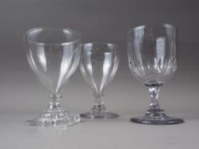 A 19th century glass rummer, on lemon squeezer base, 6" high, and two other rummers