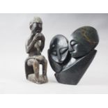 An African carved green stone double head group, by Tapina Jiri, 9" high, and a carved hardstone