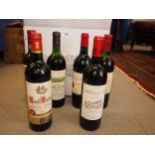 A bottle of Chateau La Cour de By 1998, three margaux and two other bottles