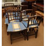 A Harlequin set of six early 19th century vertical rail back standard dining chairs with panel