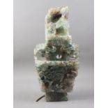 A Chinese carved fluorite two-handled vase with phoenix cover, 20" high (now converted to a table