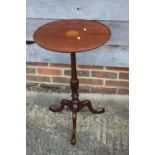 A mahogany and fan paterae inlaid circular occasional table, on tripod splay supports, 18" dia x