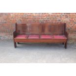 A set of three mahogany four-box seat pews, by C Mellier & Co. 76" wide x 20" deep x 36" high