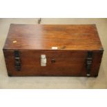 A craftsman's metal bound travelling tool chest with part fitted interior and black japanned carry