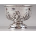 A silver pedestal bowl with embossed decoration, 4.2oz troy approx