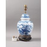 A Chinese blue and white jar and cover, decorated birds by a tree, now converted to a table lamp