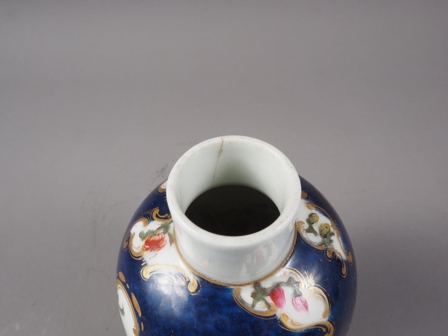 An 18th century Worcester oviform tea caddy with reserved floral panels on a blue scale ground - Image 3 of 4