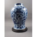 A Chinese porcelain blue and white phoenix decorated jar, 13 1/2" high (crack to base)