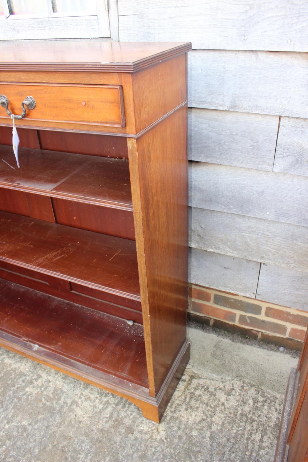 A Maples late 19th century walnut bookcase, fitted two drawers over open shelves, on bracket feet, - Image 2 of 12