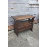 A Monk's dark oak bench with hinged panel seat, 36" wide x 28" high