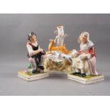 A pair of Staffordshire figures, cobbler and his wife, on square bases, 6 1/2" high, and a 19th