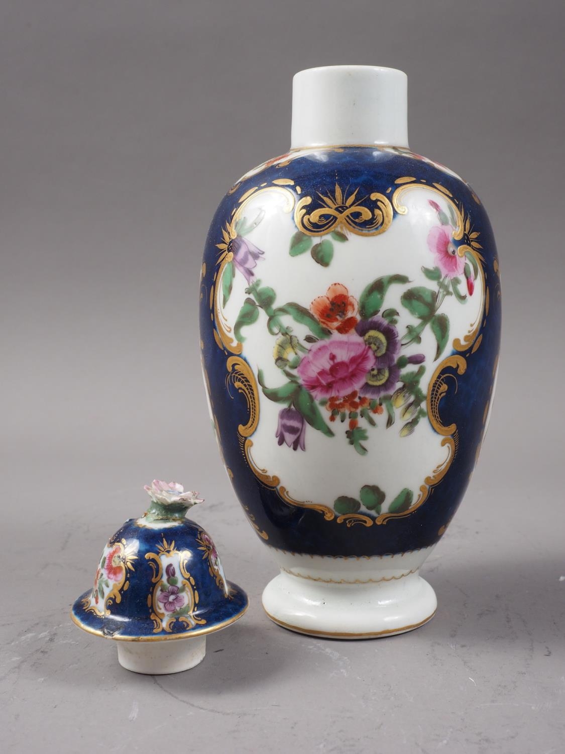 An 18th century Worcester oviform tea caddy with reserved floral panels on a blue scale ground - Image 2 of 4