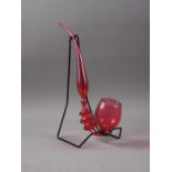 A cranberry glass pipe, 15" high