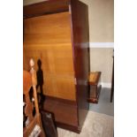 A Holland and Sons 19th century figured mahogany linen press/wardrobe enclosed mirror door and two