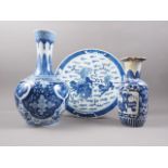 A Chinese porcelain blue and white bottle neck vase with acanthus leaf, flower, scroll and dragon