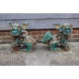 A pair of Chinese glazed pottery Dogs of Fo, 19" high (for restoration)