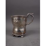 A Victorian silver christening mug with embossed decoration, 4.2oz troy approx