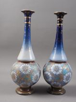A pair of Royal Doulton Slaters Patent floral decorated vases, 12 1/2" high, and a Royal Doulton