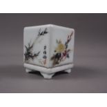 A Chinese porcelain incense cube decorated foliage and characters, 1 3/4" square