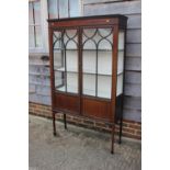 A late 19th century walnut and line inlaid display cabinet enclosed Gothic lattice glazed doors,