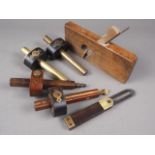 A rosewood and brass mortice gauge, three other similar gauges, a rosewood and brass right angle and