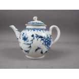 A mid 18th century Worcester blue and white globular teapot and cover with hand-painted floral