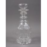 An early 19th century cut glass three ring necked decanter and a stopper, 8 1/2" high