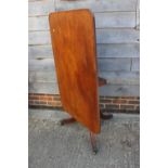 A 19th century mahogany tilt top breakfast table, on turned column and splay support, 29" wide x 46"