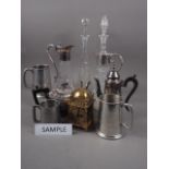 Two silver plated collared claret jugs, a plated teapot, a Picquot ware coffee pot, three decanters,