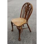 A Stewart Linford yew Windsor standard chair with pierced splat and crinoline stretcher, on turned